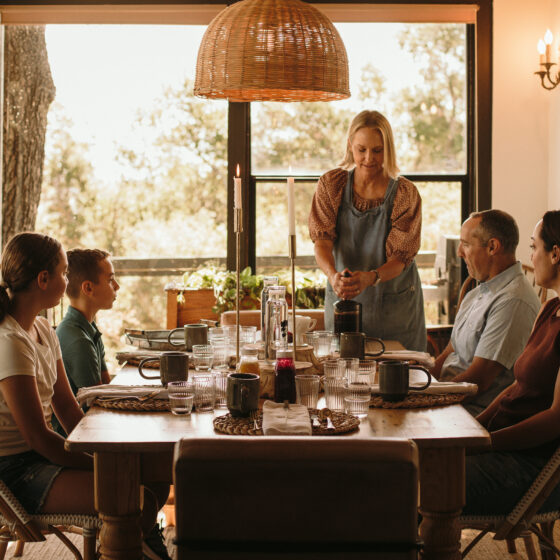 Owner Lisa Peach serving guests pour over coffee